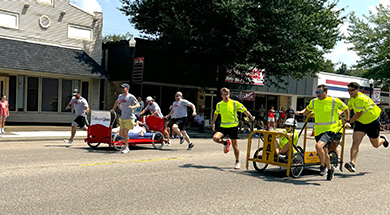 Mulzer employees running in Schweizer Fest Bed Race